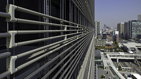 Illustration for article titled The Lattice of Tubes Covering This Building Are a Natural AC System